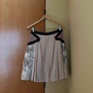 Darling full skirt with ribbon and embroidery on sides. Size 6